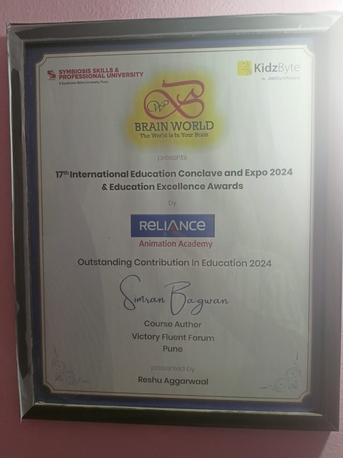Official Outstanding Contribution in Education Award Certificate issued to Simran Bagwan, 2024